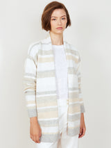 Woman wearing the Connie Cashmere Coat in Neutral Stripes by Margaret O'Leary.