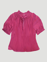 Flat lay of the Smock Neck Blouse in Fuchsia by Margaret O'Leary.
