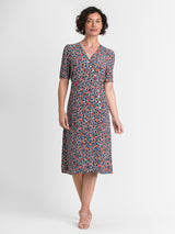Woman wearing the French Daisy Dress by Margaret O'Leary.