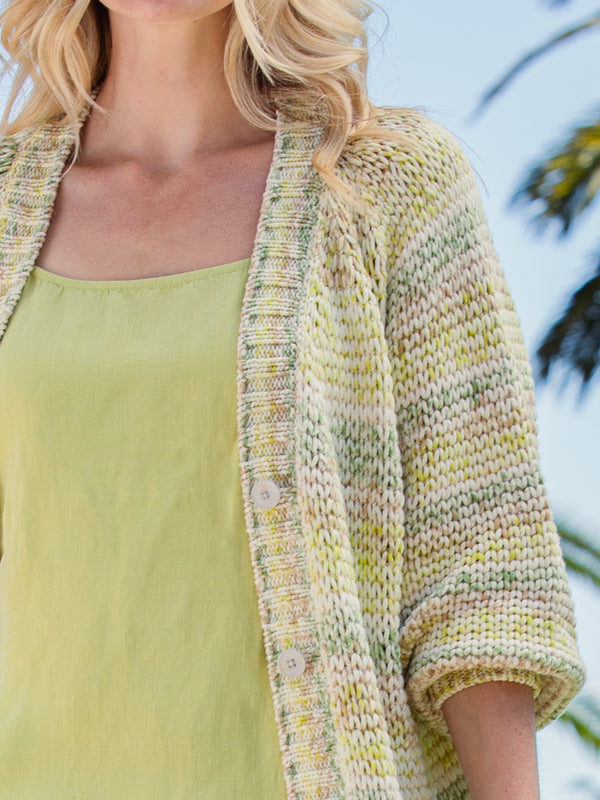 Woman wearing the Open Stitch Cardi in Meadow by Margaret O'Leary.