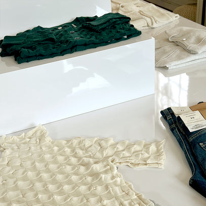 Knitwear table display at the Margaret O'Leary Burlingame store.