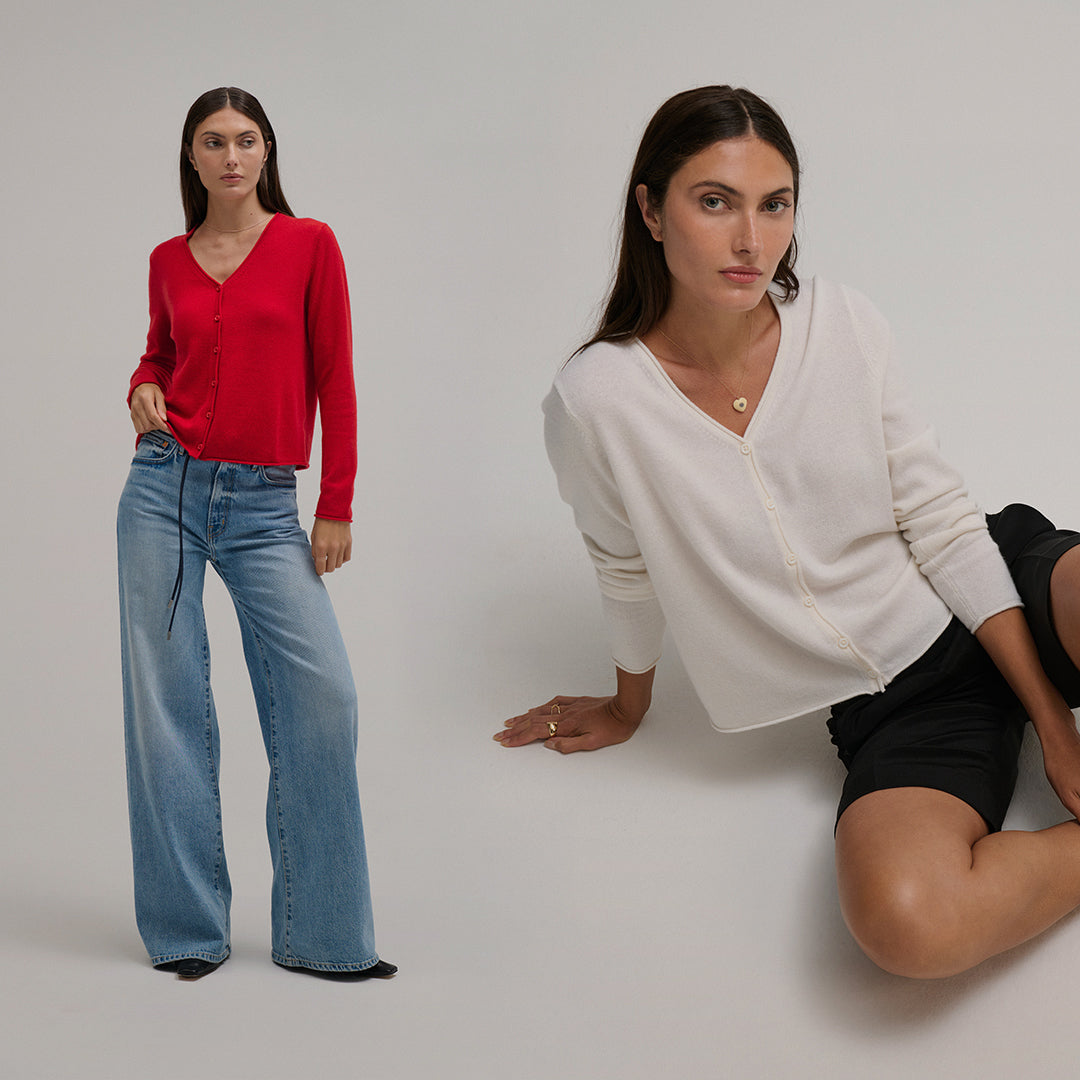 Two women wearing different colors of the Cashmere Vee Cardi by MargaretO'Leary on a plain background