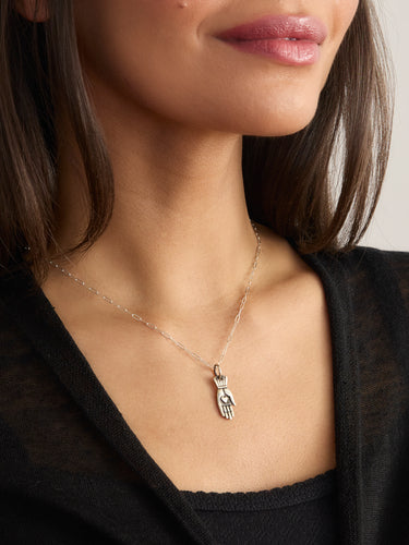 The Hand with Hearth Necklace by Feathered Soul.