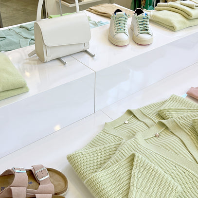 Knitwear table display at the Margaret O'Leary Manhattan Beach store.