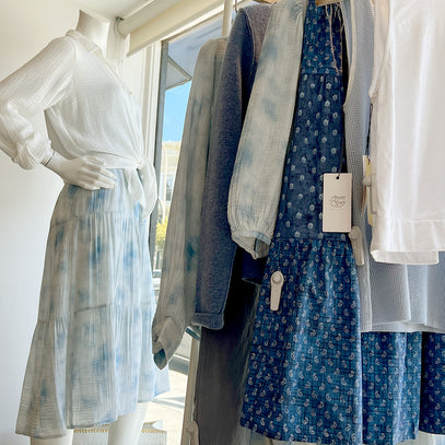 Dressed up mannequin and a rack of clothes at the Margaret O'Leary Mill Valley store.