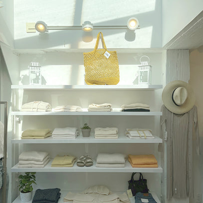Knitwear display on shelves at the Margaret O'Leary Palo Alto store.