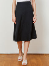 Woman wearing the Provence Circle Skirt in Black by Margaret O'Leary.