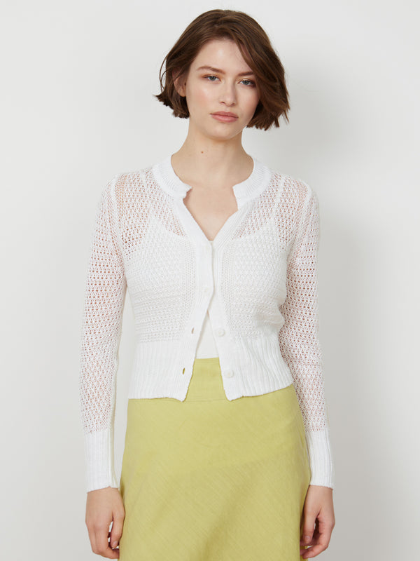 Woman wearing the Elodie Cardigan by Margaret O'Leary.