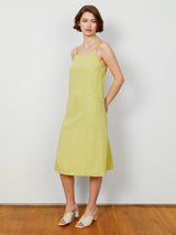 Woman wearing the Calistoga Double Strap Dress in Lemongrass by Margaret O'Leary.