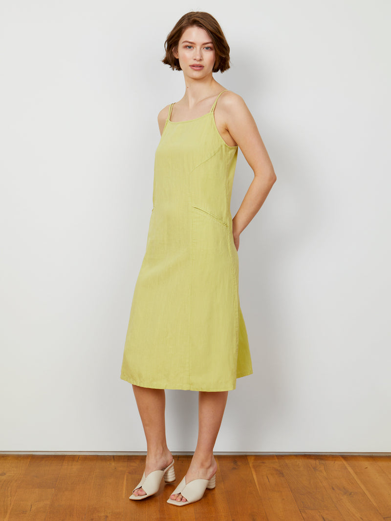 Woman wearing the Calistoga Double Strap Dress in Lemongrass by Margaret O'Leary.