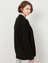 Woman wearing the Connie Cashmere Coat in Black by Margaret O'Leary.