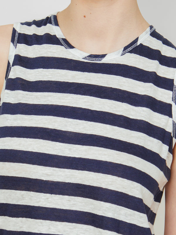 Woman wearing the Quinn Tank in Navy Stripe by Margaret O'Leary.