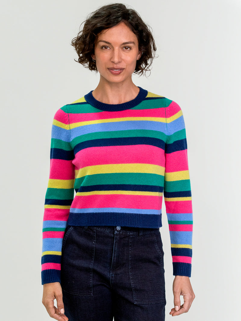 Woman wearing the cashmere pullover in crayola stripes by Margaret O'Leary.