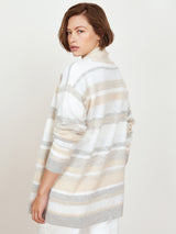Woman wearing the Connie Cashmere Coat in Neutral Stripes by Margaret O'Leary.