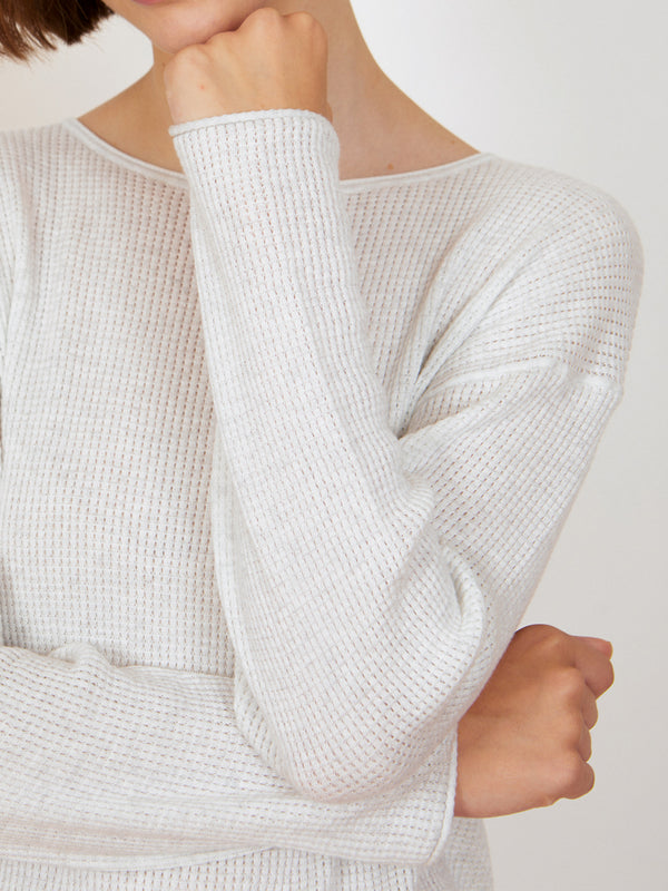 Woman wearing the Shirttail Easy Boatneck by Margaret O'Leary.