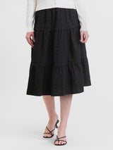Woman wearing the Lola Skirt by Margaret O'Leary.