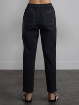 Back view of the black nolan pant.