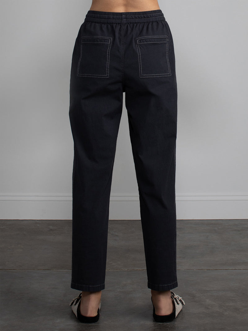 Back view of the black nolan pant.