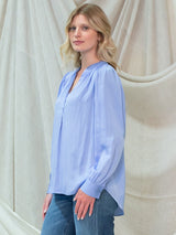 Woman wearing the Poet Top by Margaret O'Leary.