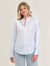 Woman wearing the Ruffle Shirt in Pool Stripe by Margaret O'Leary.