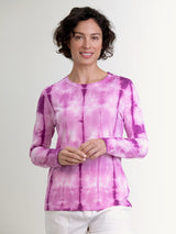  Woman wearing a purple tie dye long sleeve tee by Margaret O'Leary.