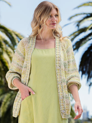 Woman wearing the Open Stitch Cardi in Meadow by Margaret O'Leary.