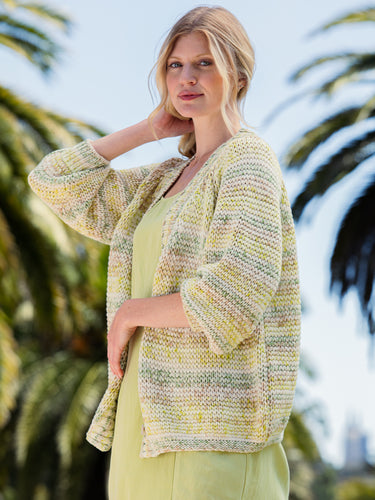 Woman wearing the Open Stitch Cardi in Meadow by Margaret O'Leary.
