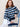 Woman wearing a Navy, royal blue and white striped cotton boucle Lolita Pullover by Margaret O'Leary against a plain background