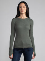 Female model in a green long sleeve
