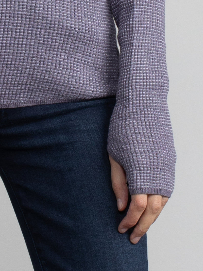 Close up of purple long sleeve