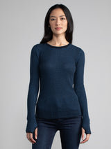 Female model in a blue long sleeve
