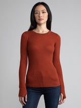 Female model in a red long sleeve