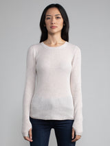 Female model in a white long sleeve