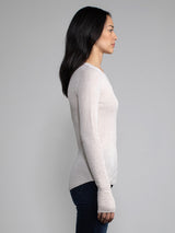 Female model in a white long sleeve