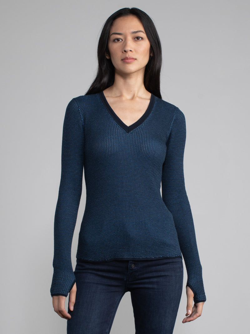 Female model in blue waffle long sleeve