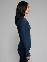 Female model in blue long sleeve