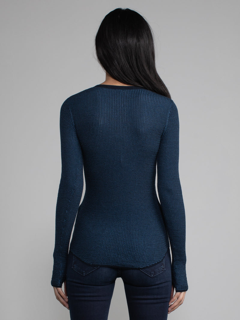 Female model in blue waffle long sleeve