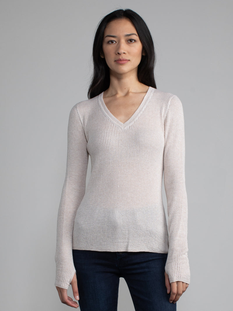 Female model in white waffle long sleeve