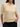 3D Polo by Margaret O’Leary, textured knit polo sweater with relaxed fit and collared neckline.