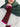 Close-up of Cashmere Texting Gloves by Margaret O’Leary, burgundy fingerless gloves with magenta trim styled with a white sweater and green wrap scarf.