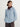 Woman wearing a light blue Diedre Cable Pullover Sweater by Margaret and burgundy cashmere triangle scarf by Margaret O'Leary over a white shirt on a plain background