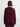 Woman wearing a maroon Diedre Cable Pullover Sweater by Margaret O'Leary over a white shirt on a plain background
