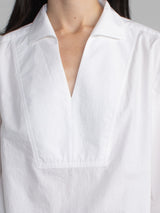 Female model in white blouse
