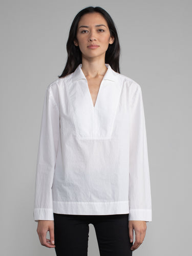 Female model in white blouse