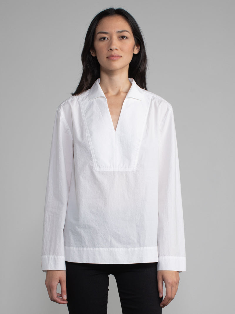 Female model in white blouse