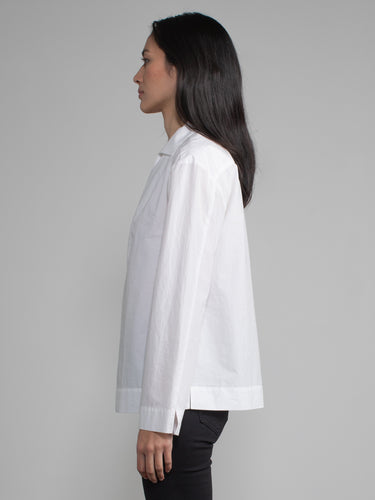 Female model in white blouse