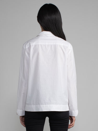Female model in white blouse