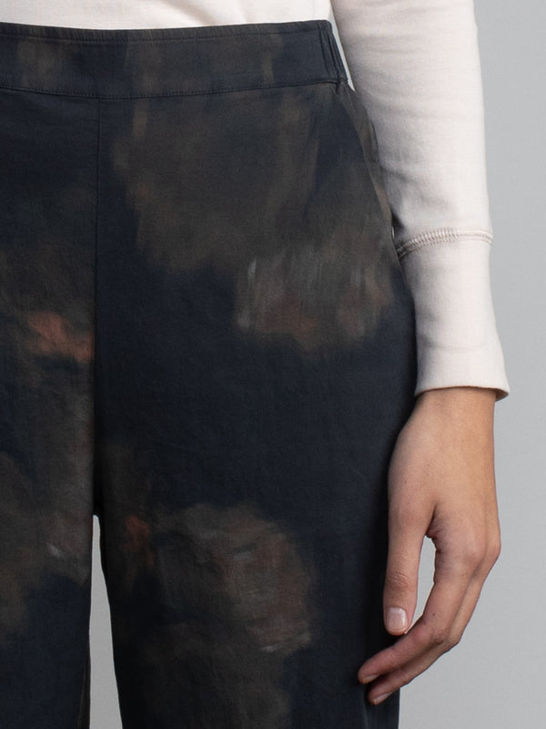 Female wearing patterned pants. 