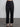 Female wearing black dress pants. 