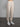 Woman wearing cream sweatpants.